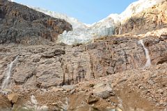22 Ice Cave Entrance In Cavell Glacier With Angel Glacier Above On Mount Edith Cavell.jpg